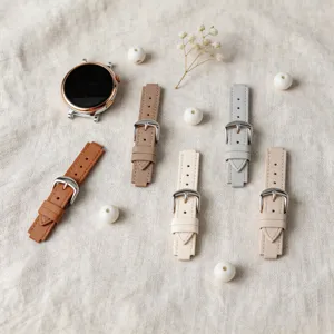 Replacement leather watch straps set with smartwatch dial, elegant flat lay style display.