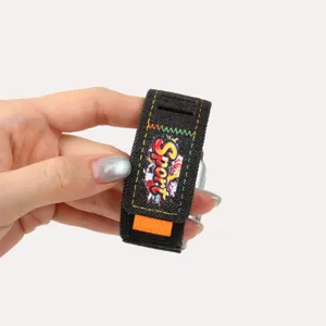 Black denim smartwatch strap compatible with Apple Watch, featuring colorful graffiti sport print.