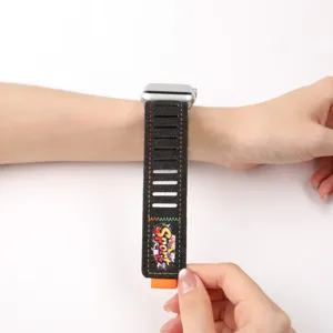 Durable denim velcro watch strap detail for apple watch, stylish graffiti sport band.