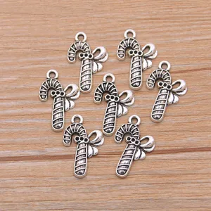 Detail of antique silver alloy Christmas candy cane bow scepter pendant DIY jewelry charm