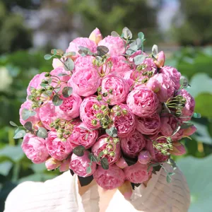 Artificial pink peony rose flower bouquet close up detail, perfect for home decor.