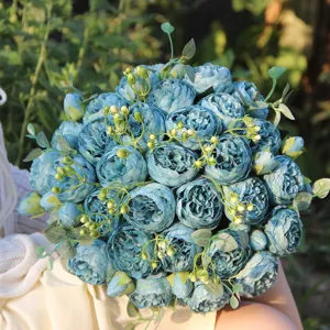 Close-up detail of blue artificial peony rose bouquet, perfect for home wedding decor.