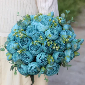 Close-up detail of blue artificial peony rose bouquet, perfect for home decor and weddings.