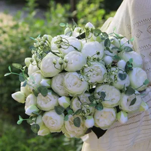 Close-up detail of white artificial peony bouquet, Korean style floral arrangement.
