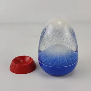 Detailaufnahme des Vulkan-Eier-Öl-Timers mit blauem Farbverlauf und rotem Basisständer.