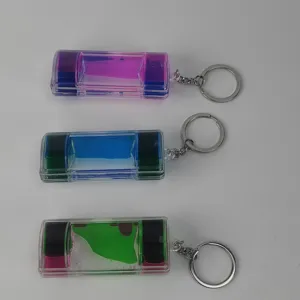 Liquid motion bubbler keychain dual color oil drop sensory toy cute bag charm accessory