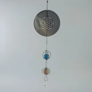 Roestvrijstalen windspel met bloem des levens patroon en kristallen hanger voor thuisdecoratie.