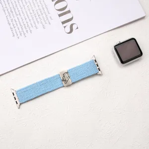 Detailed view of blue elastic nylon braided strap with cute cat charm for smart watch.
