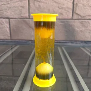 Detailansicht des gelben zylindrischen Flüssigkeits-Bewegungs-Bubblers und Öltropfenspielzeugs.