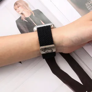 Black elastic nylon braided Apple Watch strap with cute cat metal magnetic buckle detail.