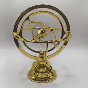 Gold celestial globe armillary sphere perpetual motion desk ornament kinetic art decor.