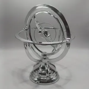 USB powered armillary sphere perpetual motion desk toy, metallic silver celestial model.
