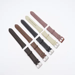 Vue detaillee de bracelets de montre en cuir veritable avec couleurs et boucles metal.