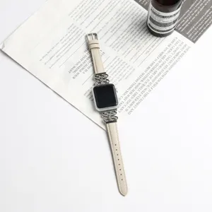 Beige leather watch strap compatible with Apple Watch, featuring elegant metal knot details.