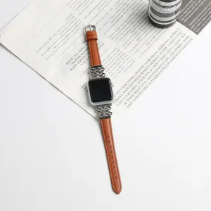Stylish leather watch band with metal Chinese knot design compatible with Apple Watch.