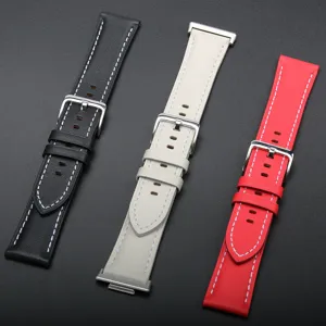 Detailed closeup of genuine leather replacement watch bands in black, white, and red.