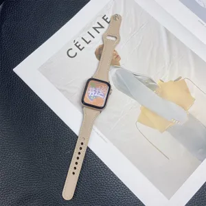 Detail shot of the beige leather slim watch band for smartwatch, elegant styling on dark surface.