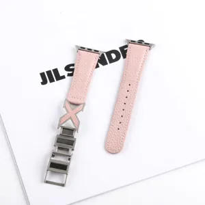 Pink litchi grain leather Apple watch band replacement with stylish metal X decoration for daily wear