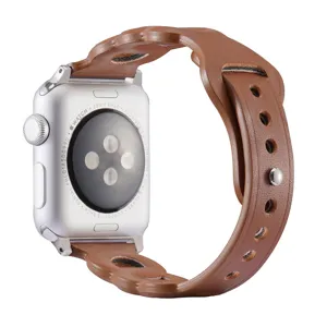 Brown leather strap compatible with Apple Watch, stylish three-ring design for daily wear.
