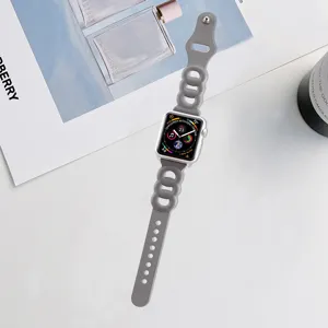Grey three-ring leather watch band compatible with Apple Watch, stylish daily accessory.