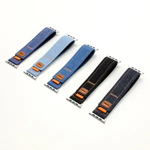 Bracelet de montre Apple en tissu denim avec connecteur métallique pour la série iWatch.