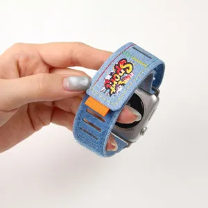 Denim watch band for Apple Watch, graffiti sport strap with velcro closure, blue replacement loop.