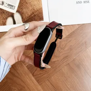 Detailed view of replacement leather silicone watch strap for Xiaomi smart band, red and black.