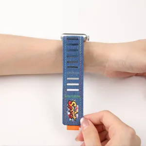 Denim Apple Watch band detail view showing comfortable wrist wear and stylish sport print.