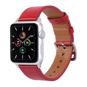 Close-up view of the premium red leather watch strap with fine stitching and silver buckle.