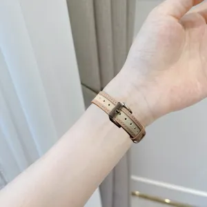 Detail view of replacement leather and canvas watch strap compatible with Apple Watch.