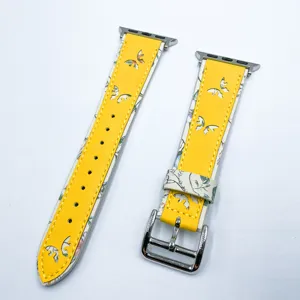 Bracelet de montre en cuir compatible Apple Watch, design évidé papillon jaune et blanc.