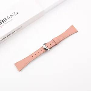 Pink lychee pattern leather watch band replacement with silver buckle detail closeup view.