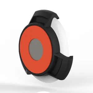 Magnetic protective case and mount for smart tracker, black and orange design accessory.