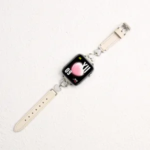 Replacement leather strap for Apple Watch with metal heart charms, stylish beige band for women.