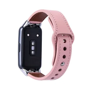 Cinturino di ricambio in pelle rosa con connettori metallici per smartband, accessorio elegante.