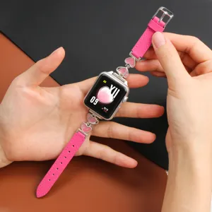 Pink leather and heart metal watch band compatible with Apple Watch, stylish women strap accessory.