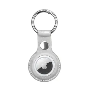 Detail shot of silver leather protective case with metal keychain ring for tracking device.