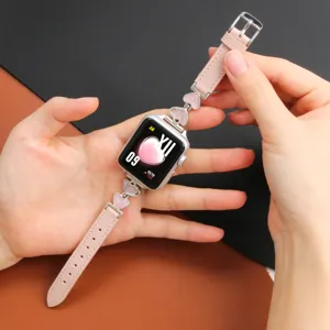 Pink leather metal heart watch strap detail, elegant replacement band compatible with smart watch.