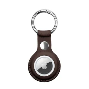 Close-up detail of dark brown leather protective case with silver metal ring for smart tracker.