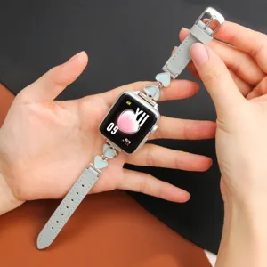 Close-up of stylish leather and metal heart watch strap, elegant design for smart watch accessory.