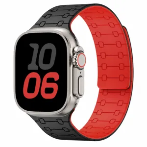 Detail view of the black and red silicone magnetic watch strap compatible with Apple Watch.