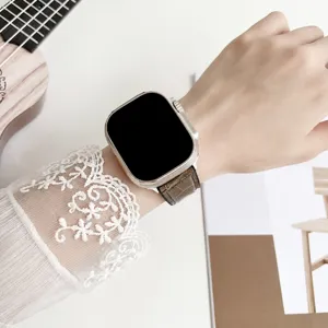 Brown leather watch strap compatible with Apple Watch Ultra series, premium textured design.