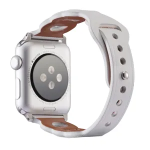 Detailed view of white leather watch band with scalloped three ring design for smartwatch.