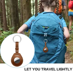 Leather keychain case detail for Apple AirTag, premium brown PU leather with metal ring.