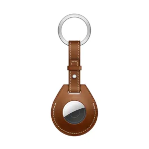 Brown leather AirTag key ring protective cover microfiber case for tracking device.