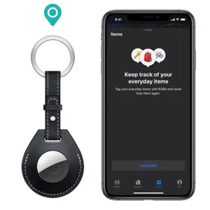 Black leather protective case and keychain for AirTag tracker with metal ring and secure snap.