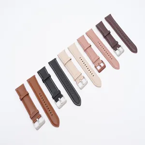 Bracelet de montre en cuir de qualité avec coutures classiques et boucle en métal élégante.