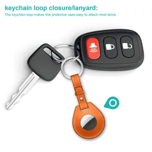 Orange leather protective case keychain designed for Apple AirTag tracker devices.