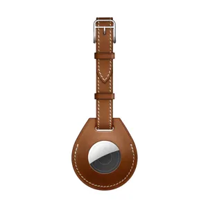 Brown leather protective case and keychain for Apple AirTag, premium texture with metal buckle.
