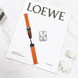 Orange leather magnetic folding clasp watch strap compatible with Xiaomi smart watch.